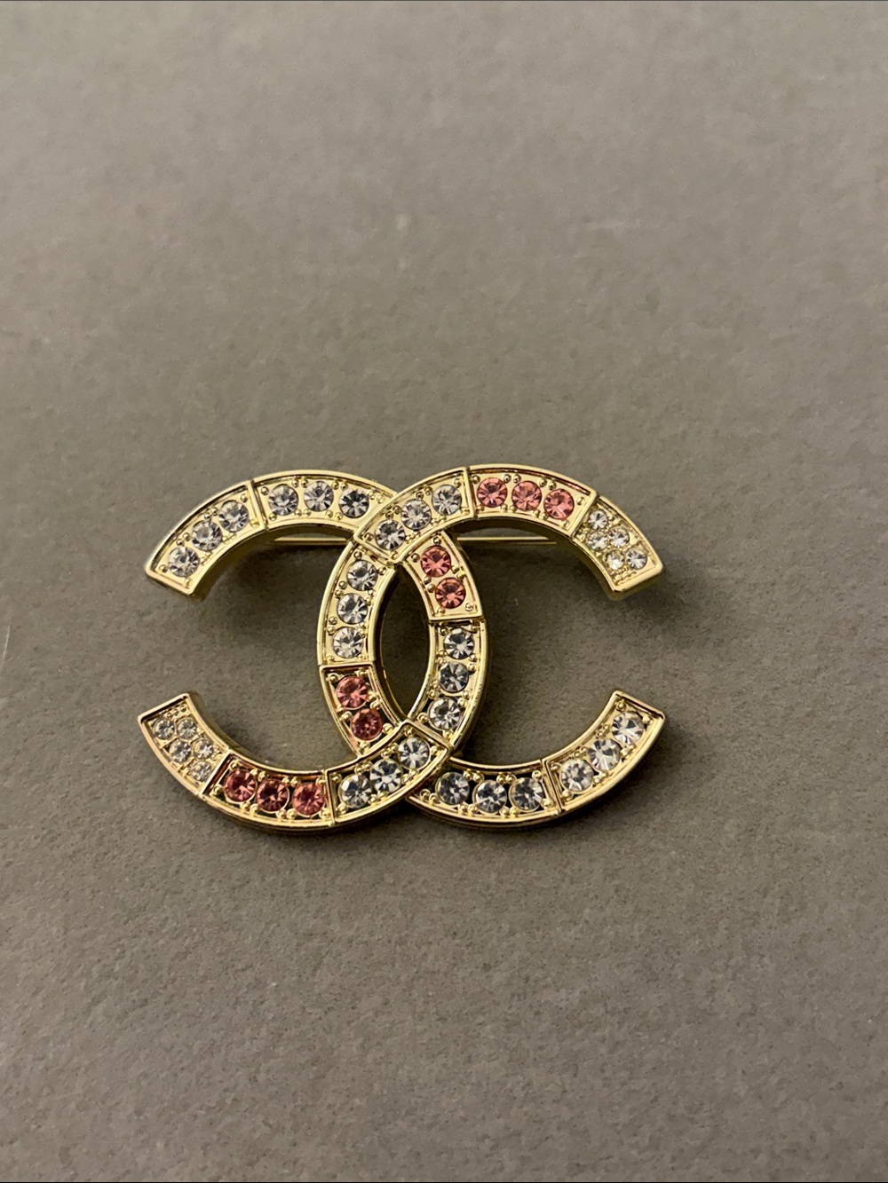 Gold-Tone Interlocking CC Brooch with Pink and Clear Crystals